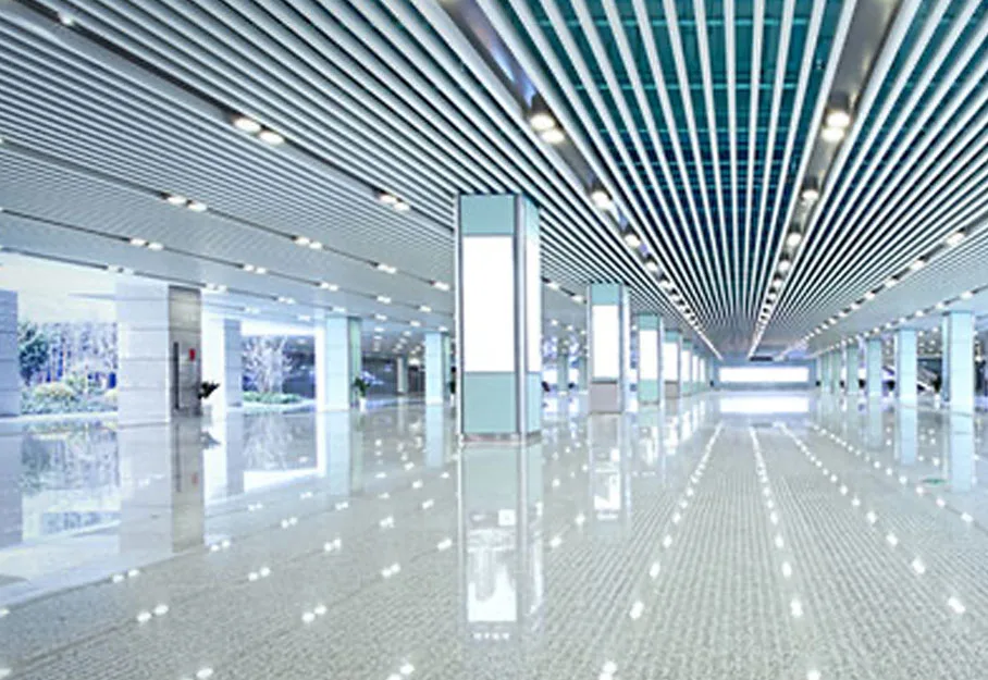 Folded colorful towels arranged on a shelf, home storage solutions.