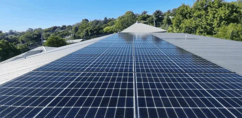 Rooftop solar panels on a house, showcasing residential solar energy solutions.