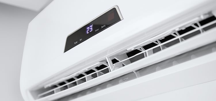 Energy-Saving Tips: Efficient Air-Con Use. Image of Air-Con unit. 